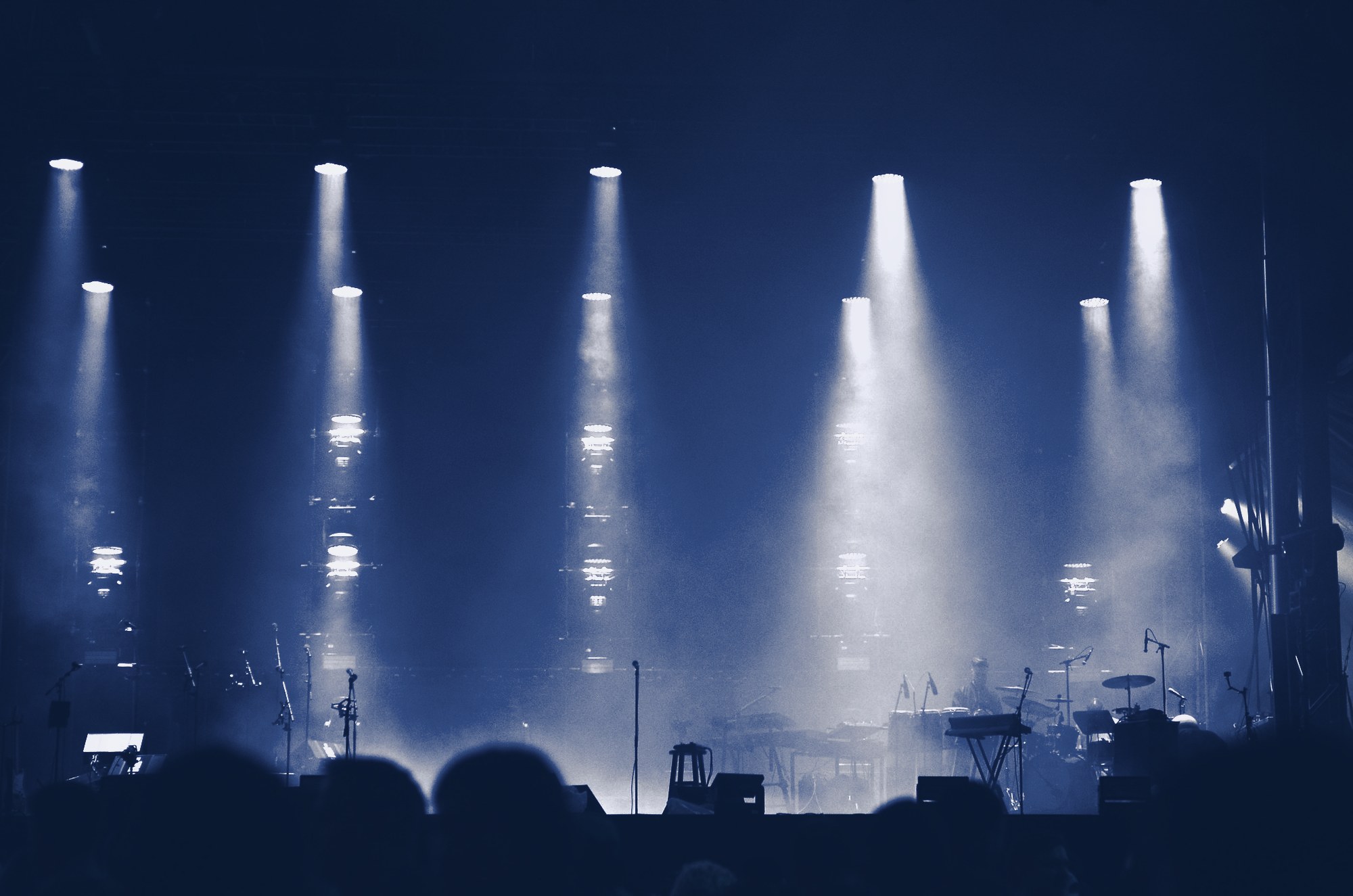Stage lights in an entertainment venue, tinted navy